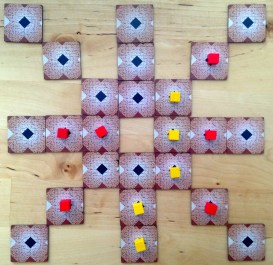Game in progress, or more or less won by yellow player.